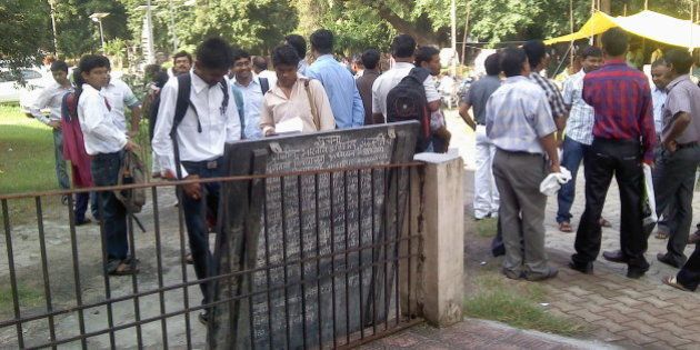 Candidates checking their roll numbers on the first day of MPSC State Services Main Examination 2012 at Vasantrao Naik Institute of Arts and Social Sciences (Morris College), Nagpur.