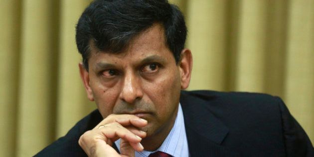 Reserve Bank of India (RBI) Governor Raghuram Rajan attends a press conference in Mumbai, India, Tuesday, June 2, 2015. India's central bank cut a key interest rate by a quarter percentage point Tuesday, the third such reduction this year in support of government efforts to boost growth. (AP Photo/Rafiw Maqbool)