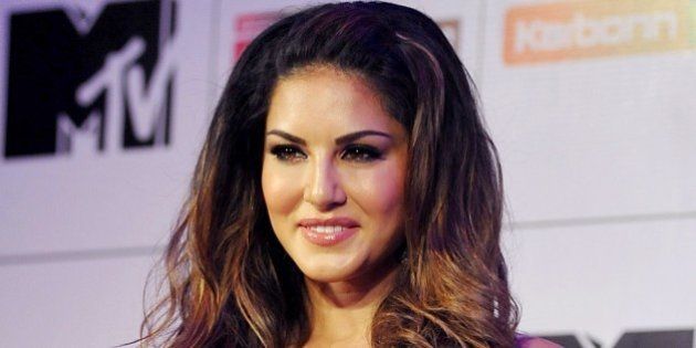 Canadian Bollywood actress Sunny Leone poses as she hosts Indian television reality show MTV Splitsvilla 8 What Women Love in Mumbai late June 30, 2015. AFP PHOTO/STR (Photo credit should read STRDEL/AFP/Getty Images)