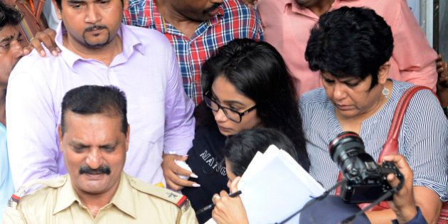 MUMBAI,INDIA AUGUST 31: Vidhie (in specs) daughter of Sanjeev Khanna and Indrani suspects in Sheena Bora murder case outside Bandra Court in Mumbai along with other relatives.(Photo by Mandar Deodhar/India Today Group/Getty Images)