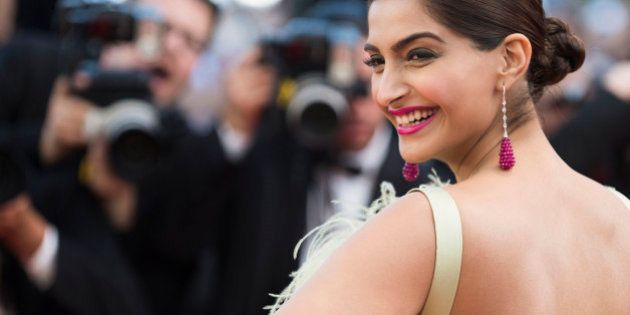 Actress Sonam Kapoor poses for photographers upon arrival for the screening of the film Inside Out at the 68th international film festival, Cannes, southern France, Monday, May 18, 2015. (Photo by Arthur Mola/Invision/AP)