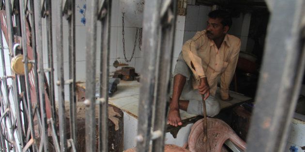 MUMBAI, INDIA - SEPTEMBER 10: Mumbai's mutton traders shut down the shops as four-day meat ban began due to Jain holy festival of Paryushan on September 10, 2015 in Mumbai, India. Earlier this week, the BMC imposed a ban on sale of meat on four days of the Paryushan festival, while the adjoining Mira-Bhayander Municipal Corporation in Thane had declared a complete ban during September 11-18. (Photo by Pramod Thakur/Hindustan Times via Getty Images)