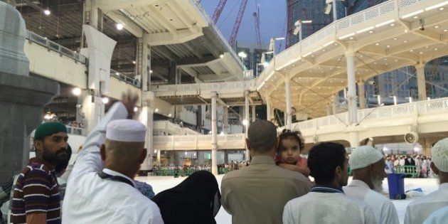 MECCA, SAUDI ARABIA - SEPTEMBER 12: A huge construction crane buffeted by strong winds collapsed and crashed through the roof of the Grand Mosque which surrounds the Kaaba, Islam's holiest site on September 12, 2015. At least 87 people have died in Friday's horrific crane accident inside the Sacred Mosque and more than 180 people injured. (Photo by Ozkan Bilgin/Anadolu Agency/Getty Images)
