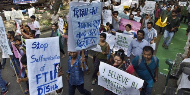 NEW DELHI, INDIA - AUGUST 3: Students of Film and Television Institute of India (FTII) joined by students from several other institutes and people from various organizations as they hold a protest march from Jantar Mantar to the Parliament House against the appointment of TV actor Gajendra Chauhan as FTII Chairman on August 3, 2015 in New Delhi, India. (Photo by Vipin Kumar/Hindustan Times via Getty Images)