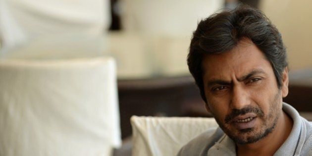 TO GO WITH India-Bollywood-entertainment-film-Siddiqui,INTERVIEW by Udita JhunjhunwalaThis photo taken on March 4, 2015 shows Bollywood actor Nawazuddin Siddiqui talking in an interview with AFP in Mumbai. It is a story worthy of a Bollywood plot: the son of a north Indian farmer, one of nine children, rising to become the face of independent Hindi cinema. But Nawazuddin Siddiqui is still getting used to his success. AFP PHOTO/PUNIT PARANJPE (Photo credit should read PUNIT PARANJPE/AFP/Getty Images)