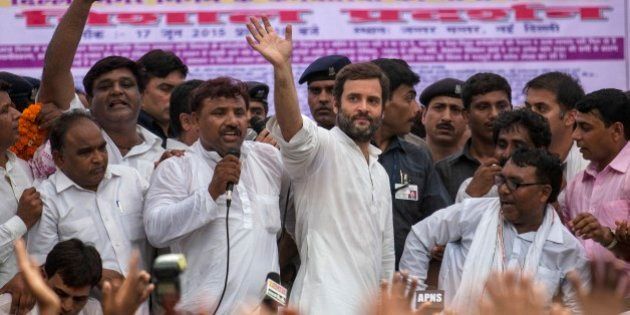 Congress party Vice President Rahul Gandhi waves as he leaves after addressing a protest by sanitation workers in New Delhi, India, Wednesday, June 17, 2015. Hundreds of sanitation workers gathered near the Indian parliament for a protest demanding the payment of wages due to them. (AP Photo/Tsering Topgyal)