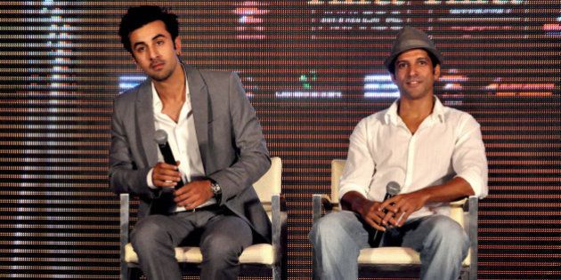 Indian Bollywood film actor Ranbir Kapoor (L) and filmmaker, script writer, actor, playback singer, lyricist and producer Farhan Akhtar attend the press conference for the announcement of the 'IIFA Awards 2012' ceremony in Mumbai on June 1, 2012. AFP PHOTO/STR (Photo credit should read STRDEL/AFP/GettyImages)