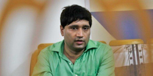 NEW DELHI, INDIA - JULY 29: Bureaucrat Sanjeev Chaturvedi interacts with the media after his name was announced among the five awardees by Ramon Magsaysay Award Foundation (RMAF), at his residence on July 29, 2015 in New Delhi, India. The Ramon Magsaysay award is given for outstanding contributions in government service, public service, community leadership, journalism, literature and creative communication arts, peace and international understanding and emergent leadership. Chaturvedi blew the whistle on alleged scam at the premier All India Institute of Medical Sciences, and Anshu Gupta heads the NGO Goonj. (Photo by Raj K Raj/Hindustan Times via Getty Images)