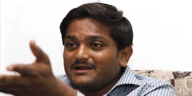 NEW DELHI, INDIA - AUGUST 30: Hardik Patel, Convener of Patidar Anamat Andolan Samiti (PAAS), during an interview with Hindustan Times, at GK-II on August 30, 2015 in New Delhi, India. Patel announced in today's press conference that he won't allow any political party to join his agitation and he wants to turn the stir into a national movement. He strongly defended his demand for reservation for Patels or Patidars, saying they are not getting jobs due to reservation. He said, 'We are not here to meet any ministers. Political parties are not welcome in the agitation.' (Photo by Virendra Singh Gosain/Hindustan Times via Getty Images)