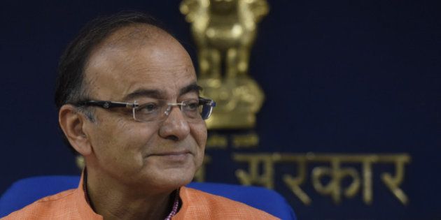 NEW DELHI, INDIA - JULY 16: Union Finance Minister Arun Jaitley addressing a media regarding cabinet meeting decisions on July 16, 2015 in New Delhi, India. In a reformist move to attract more foreign direct investment and simplify the norms, India clubbed the categories under which capital flows into domestic companies from abroad, to determine the compliance towards overseas equity cap imposed in some sectors. (Photo by Vipin Kumar/Hindustan Times via Getty Images)