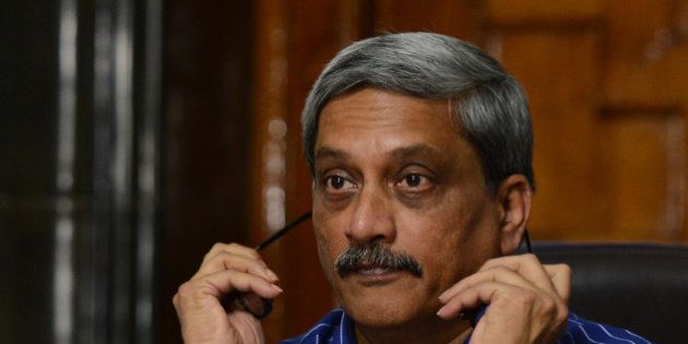 NEW DELHI,INDIA SEPTEMBER 06: Defence Minister Manohar Parrikar with MOS Rao Inderjit Singh at a press conference to announce implementation of One rank One pension scheme.(Photo by Praveen Negi/India Today Group/Getty Images)