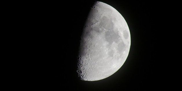 my first try with the 100-300mm Pana to capture the moon (cropped)