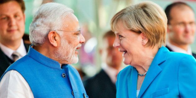 NEW DELHI, INDIA - OCTOBER 05: German Chancellor Angela Merkel and India's Prime Minister Narendra Modi during German India Government consultations on October 05, 2015 in New Delhi, India. Merkel is on a three day visit to India which will see her boost already strong ties with the country, as Germany continues to be India's most imporant European trading partner. (Photo by Michael Gottschalk/Photothek via Getty Images)