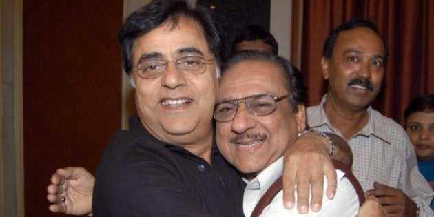 Ghazal singer Ghulam Ali, right, from Pakistan and Indian ghazal singer Jagjit Singh, left, embrace each other as they arrive to address a press conference in Bangalore, India, Friday, March 4, 2005. The two maestro are due to perform here tomorrow. (AP Photo/Gautam Singh)