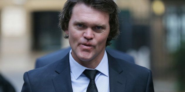 Former New Zealand cricketer Lou Vincent arrives at Southwark Crown Court where he is a witness in the trial of former New Zealand cricketer Chris Cairns, in London, Monday, Oct. 12, 2015. Cairns faces charges of perjury and perverting the course of justice in relation to a libel case he brought against Indian Premier League founder Lalit Modi. (AP Photo/Tim Ireland)