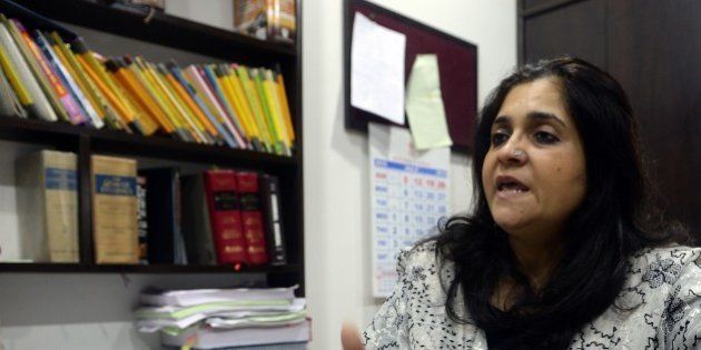 To go with 'India-politics-rights-crime' INTERVIEW by Peter HUTCHISONIn this photograph taken on July 22, 2015, Indian activist Teesta Setalvad speaks to AFP during an interview at her lawyer's office in Mumbai. A long-time critic of Indian Prime Minister Narendra Modi over religious riots 13 years ago says an investigation into allegations she received illegal funding is a 'vendetta' designed to silence her. Activist Teesta Setalvad told AFP she was being targeted by the government because of her fierce criticism of Modi following deadly violence in Gujarat state in 2002 when he was chief minister. AFP PHOTO/INDRANIL MUKHERJEE (Photo credit should read INDRANIL MUKHERJEE/AFP/Getty Images)