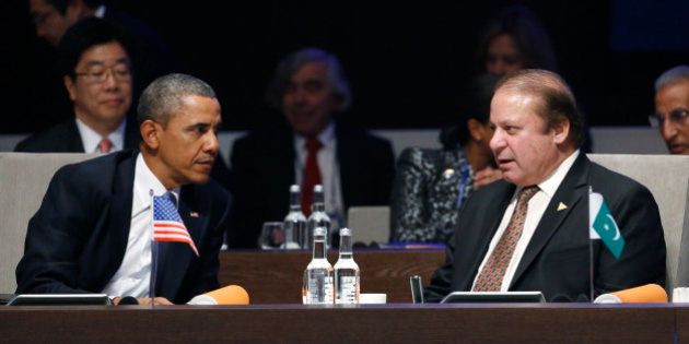 THE HAGUE, NETHERLANDS - MARCH 24: U.S. President Barack Obama (L) speaks with Pakistan's Prime Minister Nawaz Sharif during the opening session of the at the 2014 Nuclear Security Summit on March 24, 2014 in The Hague, Netherlands. The Nuclear Security Summit, held March 24-25, will be attended by world leaders and is aimed at preventing nuclear terrorism. (Photo by Yves Herman - Pool/Getty Images)