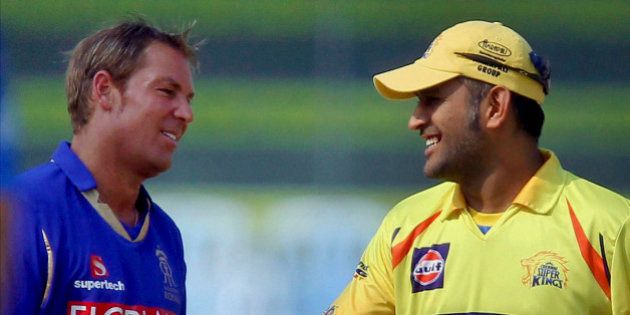Captains of Rajasthan Royals' Shane Warne, left, and Chennai Super Kings' Mahendra Singh Dhoni interact during the toss before their Indian Premier League (IPL) cricket match in Chennai, India, Wednesday, May 4, 2011. (AP Photo)