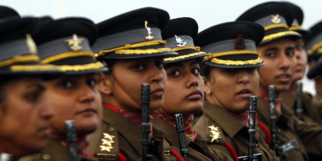 NEW DELHI, INDIA - JANUARY 15: Women officer contingent of the Indian Army march during the Army Day parade at Delhi Cantt on January 15, 2015 in New Delhi, India. It was first time a woman officer contingent was part of the parade. Every year Indian Army celebrates 15th January as Army Day to commemorate the day when General (later Field Marshal) KM Carriappa took over the command of Army from General Sir FRR Bucher, the last British Commander-in-Chief in 1949 and became the first Commander-in-Chief of Indian Army post-Independence. (Photo by Arun Sharma/Hindustan Times via Getty Images)