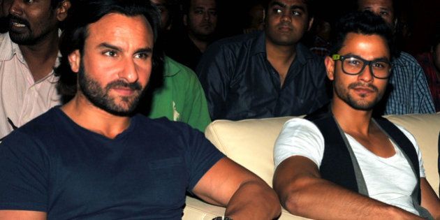 Indian Bollywood actors Saif Ali Khan (L) and Kunal Khemu (R) pose for a photo during the upcoming Hindi âGO GOA GONEâ music launch in Mumbai on April 18, 2013. AFP PHOTO/STR (Photo credit should read STRDEL/AFP/Getty Images)