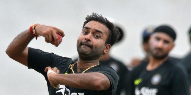 Indian cricketer Amit Mishra delivers a ball at a practice session at the R Premadasa International Cricket Stadium in Colombo on August 5, 2015. The first Test between India and Sri Lanka will be played on August 12 at the Galle International Cricket Stadium in Galle. AFP PHOTO/ Ishara S. KODIKARA (Photo credit should read Ishara S.KODIKARA/AFP/Getty Images)