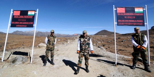 Indian Army personnel keep vigilance at Bumla pass at the India-China border in Arunachal Pradesh on October 21, 2012. Bumla is the last Indian Army post at the India-China border at an altitude of 15,700 feet above sea level. AFP PHOTO/ BIJU BORO (Photo credit should read BIJU BORO/AFP/Getty Images)