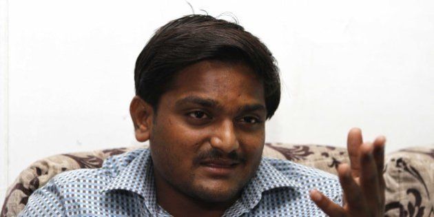 NEW DELHI, INDIA - AUGUST 30: Hardik Patel, Convener of Patidar Anamat Andolan Samiti (PAAS), during an interview with Hindustan Times, at GK-II on August 30, 2015 in New Delhi, India. Patel announced in today's press conference that he won't allow any political party to join his agitation and he wants to turn the stir into a national movement. He strongly defended his demand for reservation for Patels or Patidars, saying they are not getting jobs due to reservation. He said, 'We are not here to meet any ministers. Political parties are not welcome in the agitation.' (Photo by Virendra Singh Gosain/Hindustan Times via Getty Images)