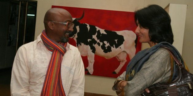 INDIA - FEBRUARY 09: Bose Krishnamachari with Tunty Chauhan at Ashna Singh Jaipuria's art show at Visual Arts Gallery, New Delhi. (Photo by Sarang Sena/The India Today Group/Getty Images)