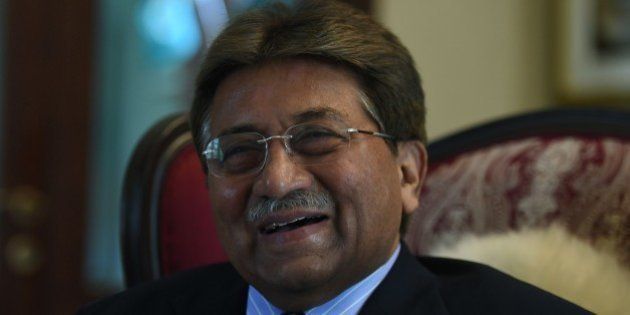 To go with Pakistan-unrest-politics-Afghanistan-India,INTERVIEW by Guillaume LAVALLÃEIn this photograph taken November 14, 2014, Pakistan's former military ruler General Pervez Musharraf smiles during an interview with AFP in Karachi. The departure of NATO combat forces from Afghanistan could push India and Pakistan towards a proxy war in the troubled state Musharraf warned in an interview with AFP. AFP PHOTO / Asif HASSAN (Photo credit should read ASIF HASSAN/AFP/Getty Images)
