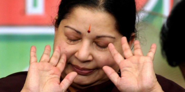 All India Anna Dravida Munnetra Kazhagam (AIADMK) party chief Jayalalitha gestures during a hunger strike in Chennai, India, Sunday, March. 18, 2007.Jayalalithaa Sunday went on a one-day token fast demanding notification of the Cauvery Water Disputes Tribunal's final award in the Central gazette, amidst chaos and unruly scenes around the venue here according to a news agency. (AP Photo/M. Lakshman)