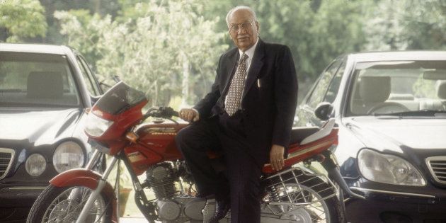 INDIA - AUGUST 22: Brijmohan Lall Munjal, Chairman, Hero Honda Motors Ltd sitting on his motorcycle ( Business, Profile ) (Photo by Bandeep Singh/The India Today Group/Getty Images)