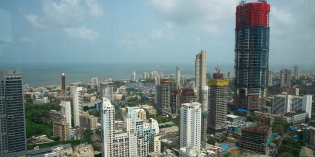 High rises now occupy the prime real estate that once housed the city's textile mills a few decades ago in Mumbai, Wednesday, July 15, 2015 (AP Photo/Rafiq Maqbool)