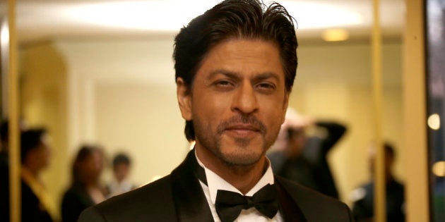 Shah Rukh Khan poses for photographers upon arrival at The Asian Awards in central London, Friday, 17 April, 2015. (Photo by Joel Ryan/Invision/AP)