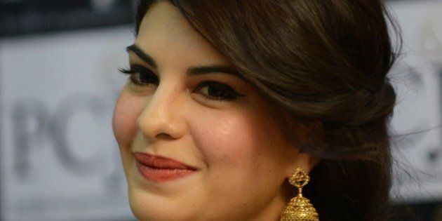 Indian Bollywood actress Jacqueline Fernandez looks on during a promotional event for a jeweller's in Ahmedabad on January 18, 2014. AFP PHOTO/Sam PANTHAKY (Photo credit should read SAM PANTHAKY/AFP/Getty Images)
