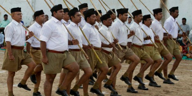 Members of the Rashtriya Swayamsevak Sangh (RSS), or National Volunteers Force, perform drills during their foundation day celebrations in Ahmadabad, India, Sunday, Oct. 17, 2010.The RSS is the ideological parent of the right-wing Hindu nationalist Bharatiya Janata Party. (AP Photo/Ajit Solanki)
