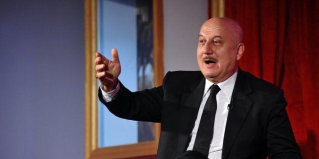 Indian Bollywood actor Anupam Kher announces season 2 of his show The Anupam Kher Show - Kucch Bhi Ho Sakta Hai' in Mumbai late on July 21, 2015. AFP PHOTO (Photo credit should read STR/AFP/Getty Images)