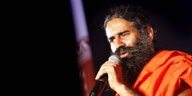 NEW DELHI, INDIA - OCTOBER 9: Yoga Guru Baba Ramdev addresses during a press conference on October 9, 2015 in New Delhi, India. Future Group tied up with Yoga Guru Baba Ramdev's Patanjali Ayurved to sell the latter's products. (Photo by Arun Sharma/Hindustan Times via Getty Images)