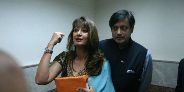 MUMBAI, INDIA - AUGUST 6: (File photo) Indian politician Shashi Tharoor with his wife Sunanda Pushkar Tharoor at Lalit Doshi Memorial Award 2009-2010 at Y.B. Chavan Auditorium, Churchgate on August 6, 2010 in Mumbai, India. Sunanda Pushkar, the 52-year-old industrialist wife of Union HRD minister Shashi Tharoor was found dead on Friday at a seven-star hotel where the couple had checked in together a day earlier, the police said. News of her death emerged late in the evening, coming within two days of her Twitter spat with a Pakistani journalist, Mehr Tarar, over an alleged affair with the minister. Pushkar, who has business interests in Dubai and was the Congress ministerâs third wife, was found dead in the bedroom of The Leela Palace suite number 345 around 8.15pm. Mehr Tarar, a columnist with Pakistanâs Daily Times, reacted to the news of Pushkarâs death in two consecutive tweets: What the hell. Sunanda. Oh my God and I just woke up and read this. Im absolutely shocked. This is too awful for words. So tragic I dont know what to say. Rest in peace, Sunanda. (Photo by Hemant Padalkar/Hindustan Times via Getty Images)