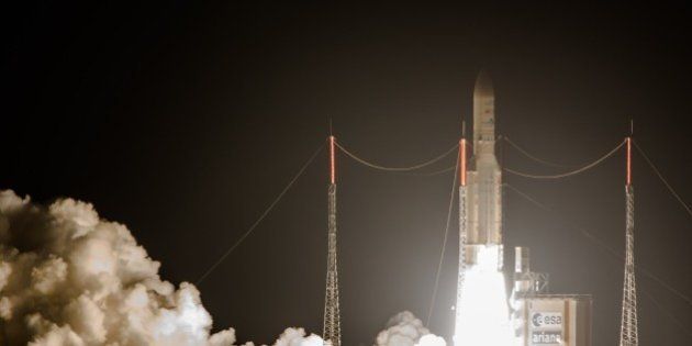 The Ariane 5 rocket lifts off from the Ariane Launchpad Area at the European Spaceport in Kourou, in French Guiana, on November 10, 2015. The rocket successfully launched a pair of communications satellites, the ARABSAT-6B (BADR 7) for the saoudian operator Arabsat and the GSAT-15 satellite for the Indian operator Insat. AFP PHOTO / JODY AMIET (Photo credit should read JODY AMIET/AFP/Getty Images)
