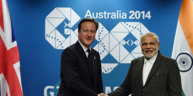 BRISBANE, AUSTRALIA - NOVEMBER 14: British Prime minister David Cameron (left) shakes hands with Indian Prime Minister Narendra Modi during a bilateral meeting at the Brisbane Convention and Exhibitions Centre (BCEC) on November 14, 2014 in Brisbane Australia. World leaders have gathered in Brisbane for the annual G20 Summit and are expected to discuss economic growth, free trade and climate change as well as pressing issues including the situation in Ukraine and the Ebola crisis. (Photo by Lukas Coch-Pool/Getty Images)