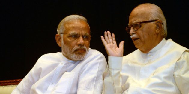 NEW DELHI,INDIA APRIL 21: Prime Minister Narendra Modi with veteran BJP leader LK Advani during the BJP parliamentary board meeting in New Delhi.(Photo by Praveen Negi/India Today Group/Getty Images)
