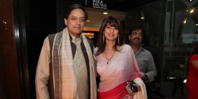 NEW DELHI, INDIA - MARCH 26: Member of Parliament Shashi Tharoor and his wife Sunanda attends a promotional event to unveil the new issue of Stardust Magazine at F-Bar, Hotel Ashok on March 26, 2012 in New Delhi, India. (Photo by Raajeesh Kashyap / Hindustan Times via Getty Images)