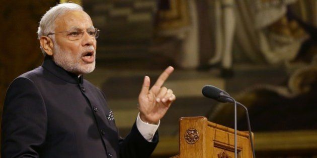 Indian Prime Minister Narendra Modi addresses members of parliament and invited guests in the Royal Gallery at the Houses of Parliament in central London on November 12, 2015. London is rolling out the red carpet for Modi on his three-day visit to Britain, the first by an Indian prime minister in nearly 10 years. He will meet Queen Elizabeth II on Friday and address a huge rally at Wembley Stadium. AFP PHOTO / POOL / KIRSTY WIGGLESWORTH (Photo credit should read KIRSTY WIGGLESWORTH/AFP/Getty Images)