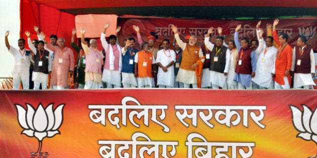 MADHUBANI, INDIA - NOVEMBER 1: Prime Minister Narendra Modi during an election campaign rally for Bihar Assembly elections on November 1, 2015 in Madhubani, India. Bihar will hold five-phase elections between October 12 and November 5 to elect the 243-member assembly. Counting of votes will take place on November 8. BJP led NDA and Grand Secular Alliance comprising of RJD, JD (U) and Congress are two main coalitions vying to form the next government in the state. (Photo by Hindustan Times via Getty Images)