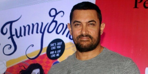 Indian Bollywood actor Aamir Khan poses for a photograph during the launch of the 'Miss Funnybones' book written by actress, columnist and interior designer Twinkle Khanna in Mumbai on late August 18, 2015. AFP PHOTO / STR (Photo credit should read STRDEL/AFP/Getty Images)
