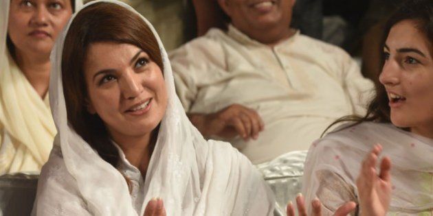 Reham Khan, wife of Pakistani opposition leader Imran Khan is pictured during his husband's campaign meeting ahead of the by-election for NA-122 (a constituency for the National Assembly of Pakistan) to be held on October 11 in Lahore on October 4, 2015. AFP PHOTO / Arif ALI (Photo credit should read Arif Ali/AFP/Getty Images)