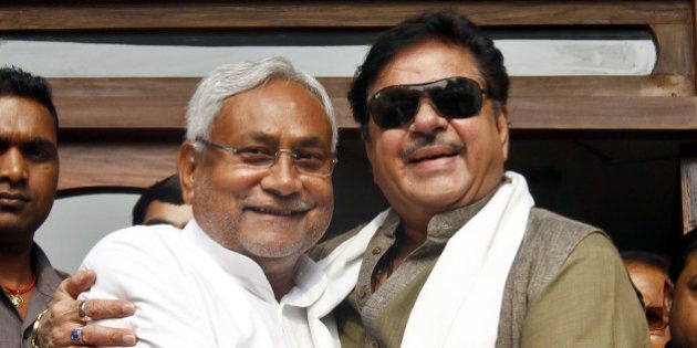 PATNA, INDIA - NOVEMBER 9: India film actor and BJP leader Shatrughan Sinha meets JD(U) leader and Bihar Chief Minister Nitish Kumar a day after the grand alliance swept the state assembly polls on November 9, 2015 in Patna, India. The newly-formed JD(U)-RJD-Congress alliance defeated Narendra Modi led NDA alliance by securing 178 seats in the 243-member House. RJD emerged the leader of the pack with 80 seats while JD(U) bagged 71 in the recently-concluded Bihar polls. (Photo by Ajay Aggarwal/Hindustan Times via Getty Images)