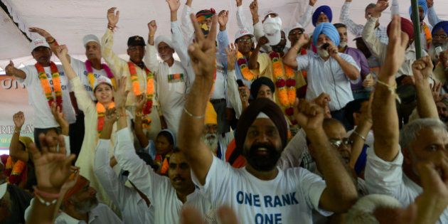 NEW DELHI,INDIA SEPTEMBER 06: Indian Army veterans celebrate following the government's announcement that it will accept One Rank One Pension (OROP) reforms in New Delhi.(Photo by Pankaj Nangia/India Today Group/Getty Images)