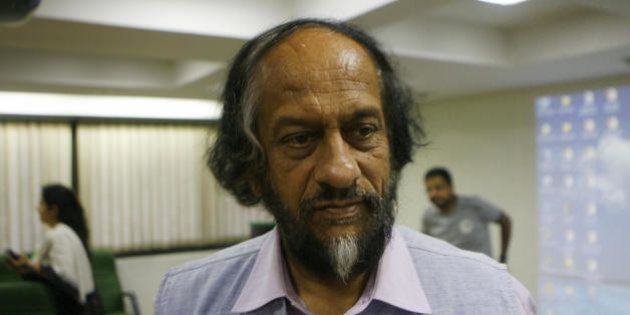 Director-General, TERI and Chairman, Intergovernmental Panel on Climate Change R.K. Pachauri chats with journalists after a press conference in New Delhi on July 8, 2008, on opportunities and implications Related to India's National Action Plan on Climate Change (NAPCC). The NAPCC was unveiled on June 30, demonstrating India's commitment to meeting the challenges of climate change, NAPCC signals India's intent to move towards greater use of renewable energy resources and more efficient managemnet of critical natural resources such as water. AFP PHOTO/ Manpreet ROMANA (Photo credit should read MANPREET ROMANA/AFP/Getty Images)
