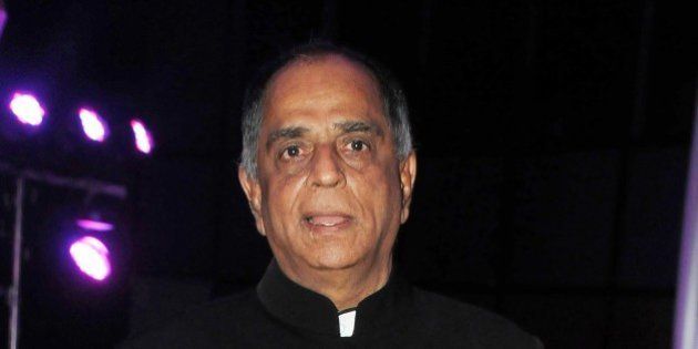 Indian Bollywood film producer and Censor Board chairperson Pahlaj Nihalani attends the wedding reception of Kussh Sinha, son of Bollywood veteran actor Shatrughan Sinha, and Taruna Agarwal in Mumbai on January 19, 2015. AFP PHOTO/STR (Photo credit should read STRDEL/AFP/Getty Images)